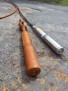 Old Submersible pump next to a new one Connecticut Well Pump Replacement