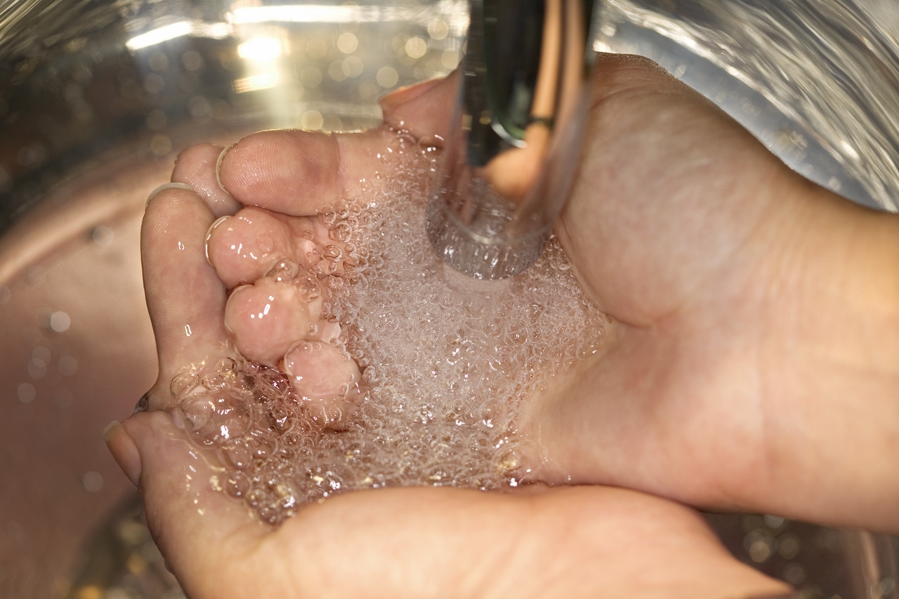 Washing Hands In Sink