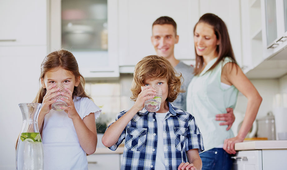 family drinking water