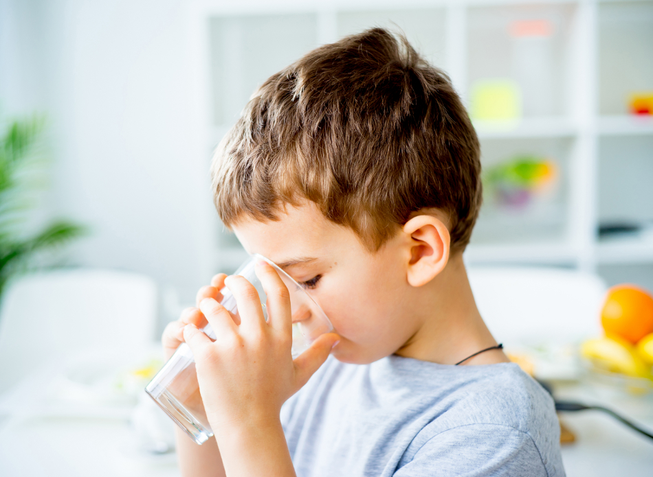 Kid Drinking Water From Glass