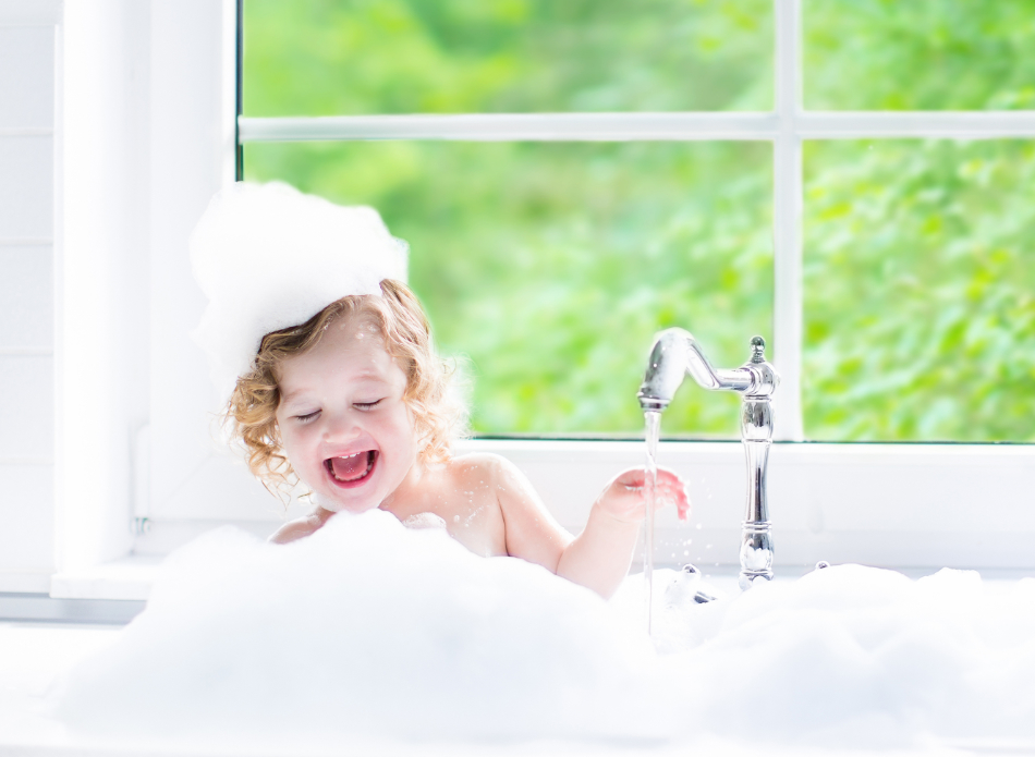 Kid Taking Bath in Sink