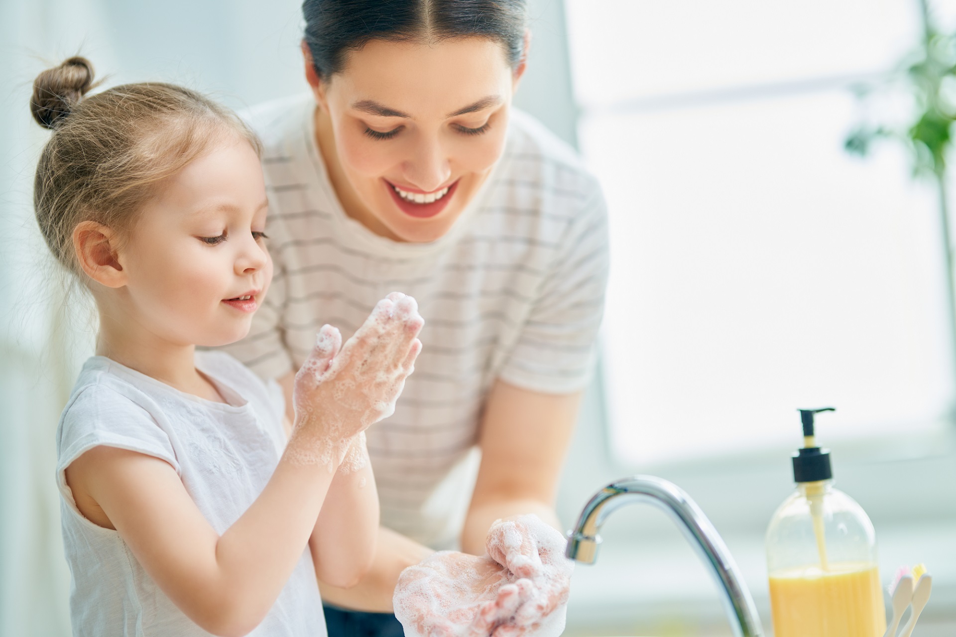 Washing Hands in Sink Water Softened