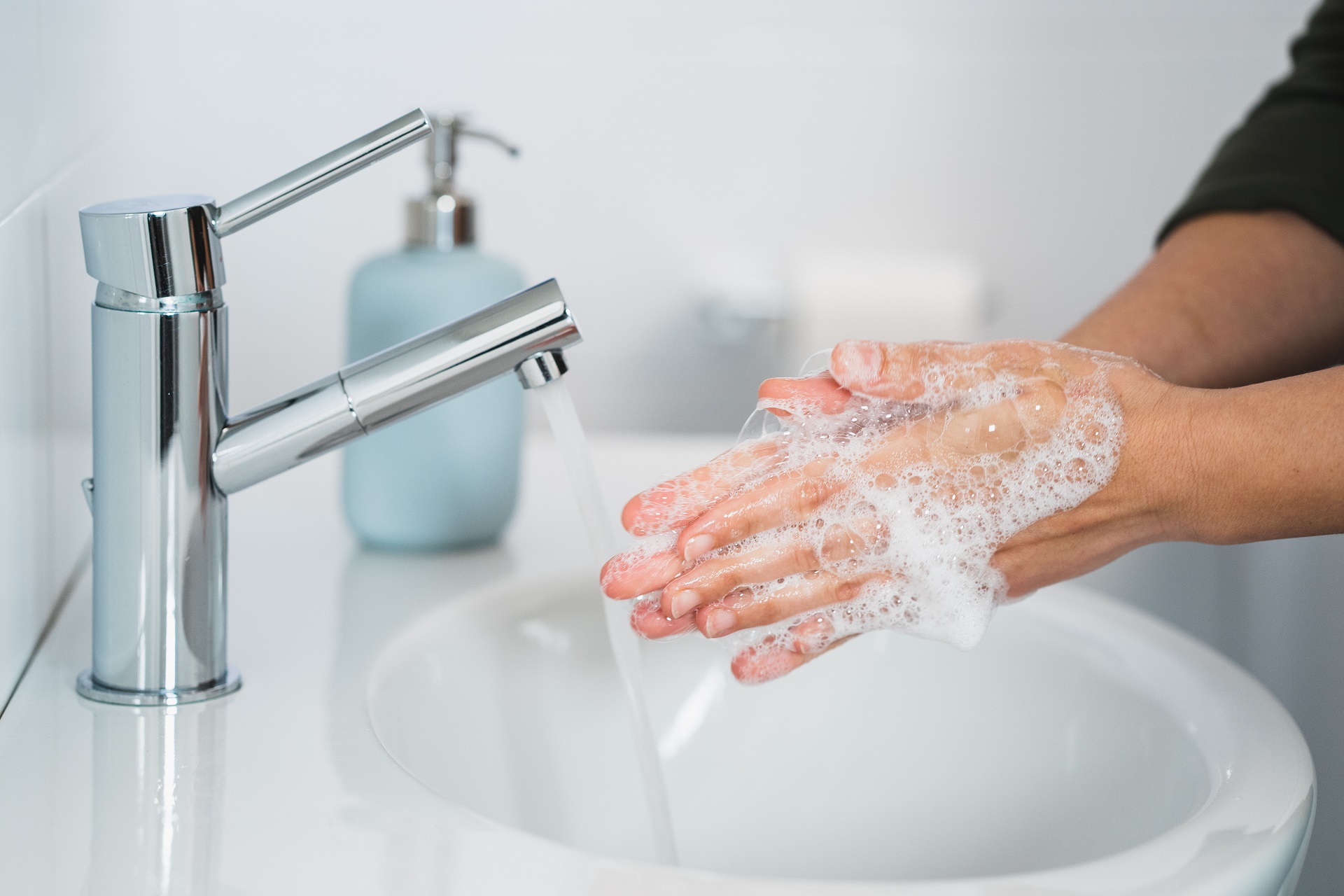 Washing Hands in Sink Water Softened