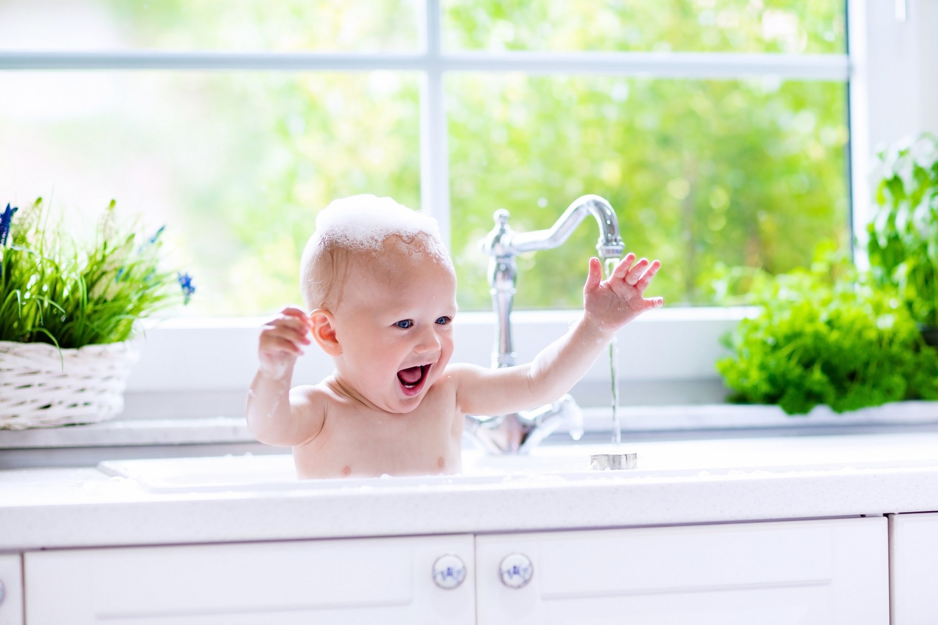 Baby Taking Sink Bath Softened Water